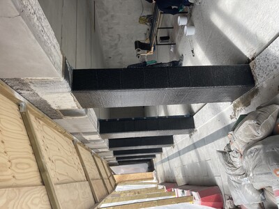 Forstærkning af etablerede søjler i bagvæg 